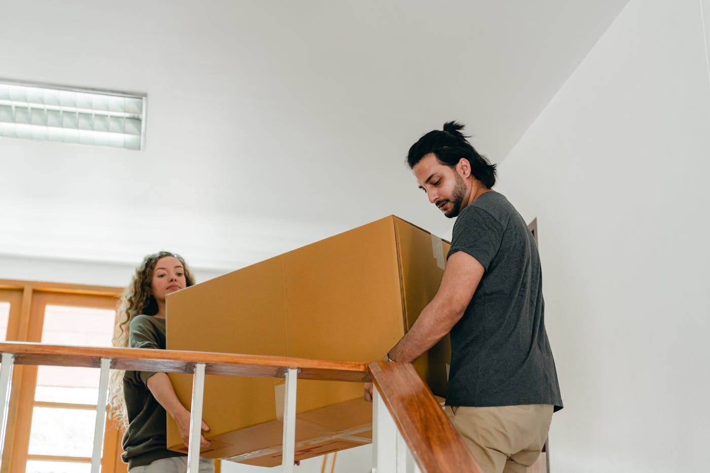 Houston apartment movers wrapping furniture
